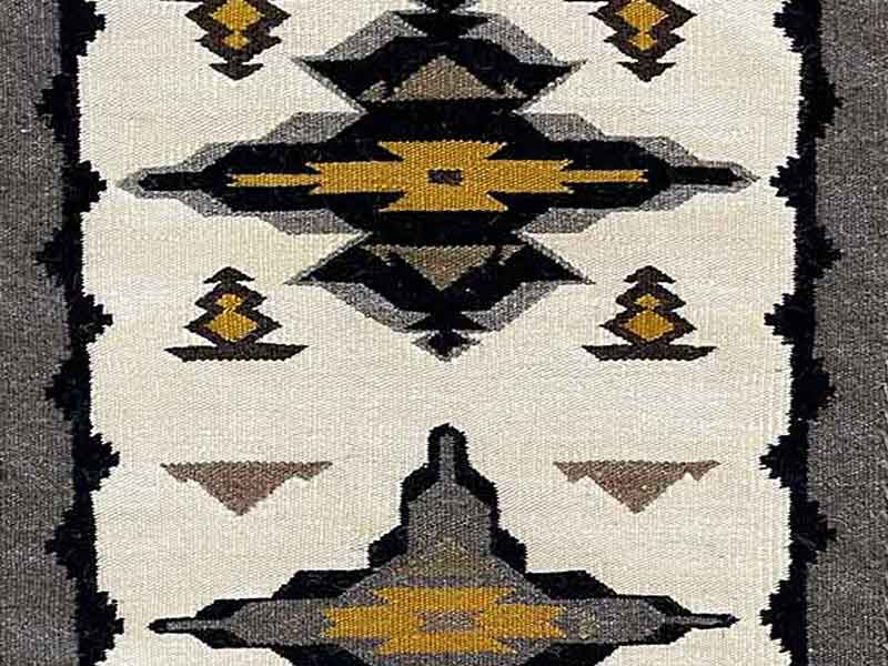 Crown Point – Navajo Reservation rug. Three large medallions with a natural gray border. Handspun white, black, gray, and tan yarns