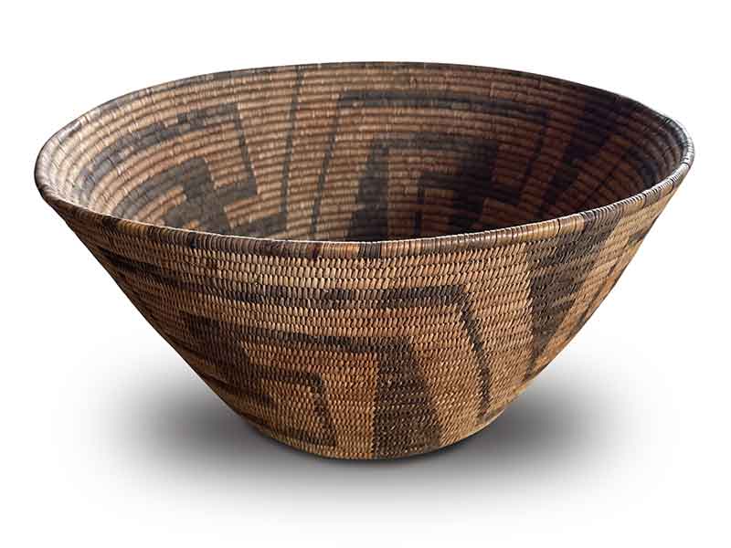 Early Pima basket with classic whirling log design