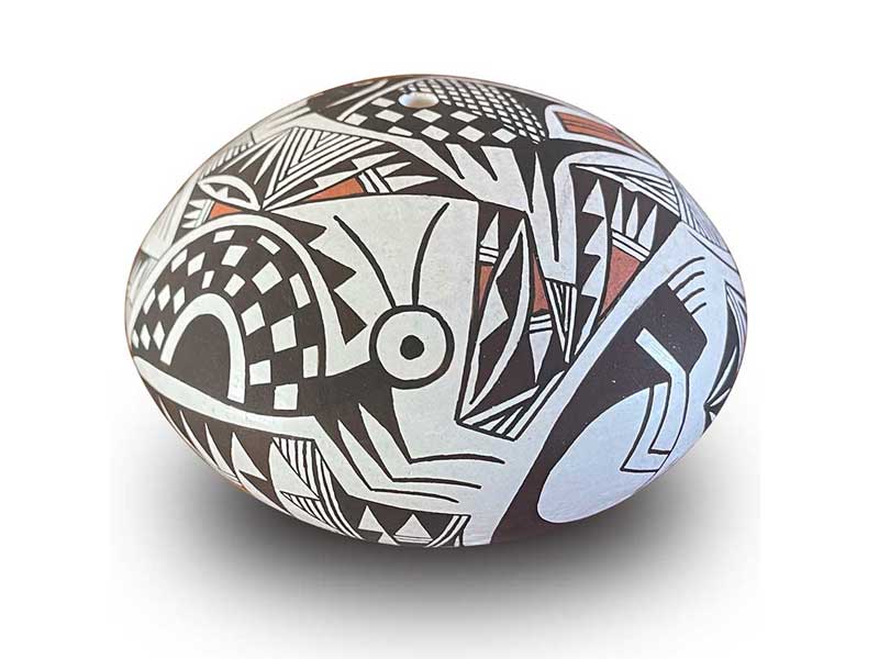 Acoma seed jar with with Mimbres fish, gecko, flute players intertwined with Mimbres style geometric designs