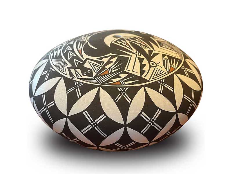 Acoma seed jar with with Mimbres rabbit, gecko, and fireflies intertwined with Mimbres style geometric designs, topping interlocking elegant geometric designs