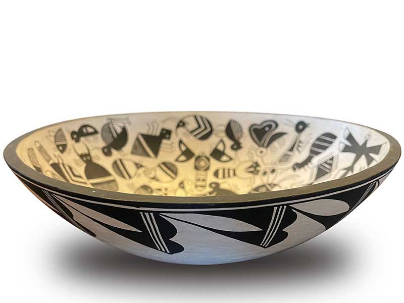 Acoma bowl with multiple different Mimbres designs